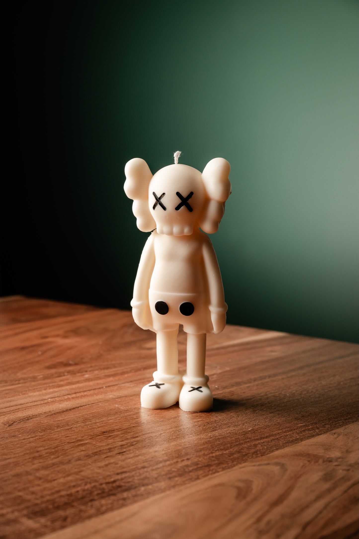 Standing KAWS inspired candle handmade in Canada from soy wax, eco-friendly sculpture décor for collectors